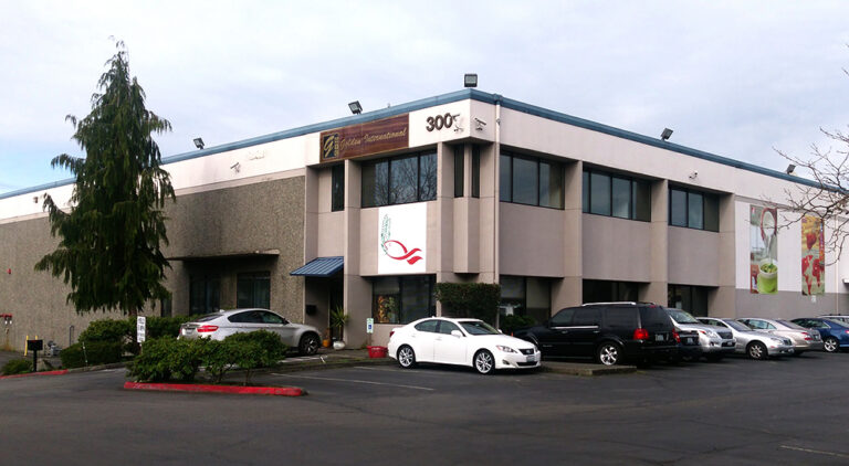 Building with cars parked outside